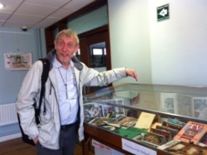 Michael Rosen admiring the 'Suburbs in Cinema' exhibition (curated by Sarah McKenna and Emily Pickthall using materials from the Bill Douglas Cinema Museum), Imagining the Suburbs Conference, University of Exeter, June 2014. 